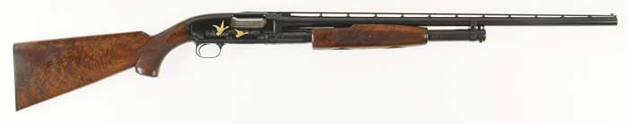 Appraisal: SPECTACULAR FACTORY ENGRAVED WINCHESTER MODEL PUMP SHOTGUN Cal ga SN