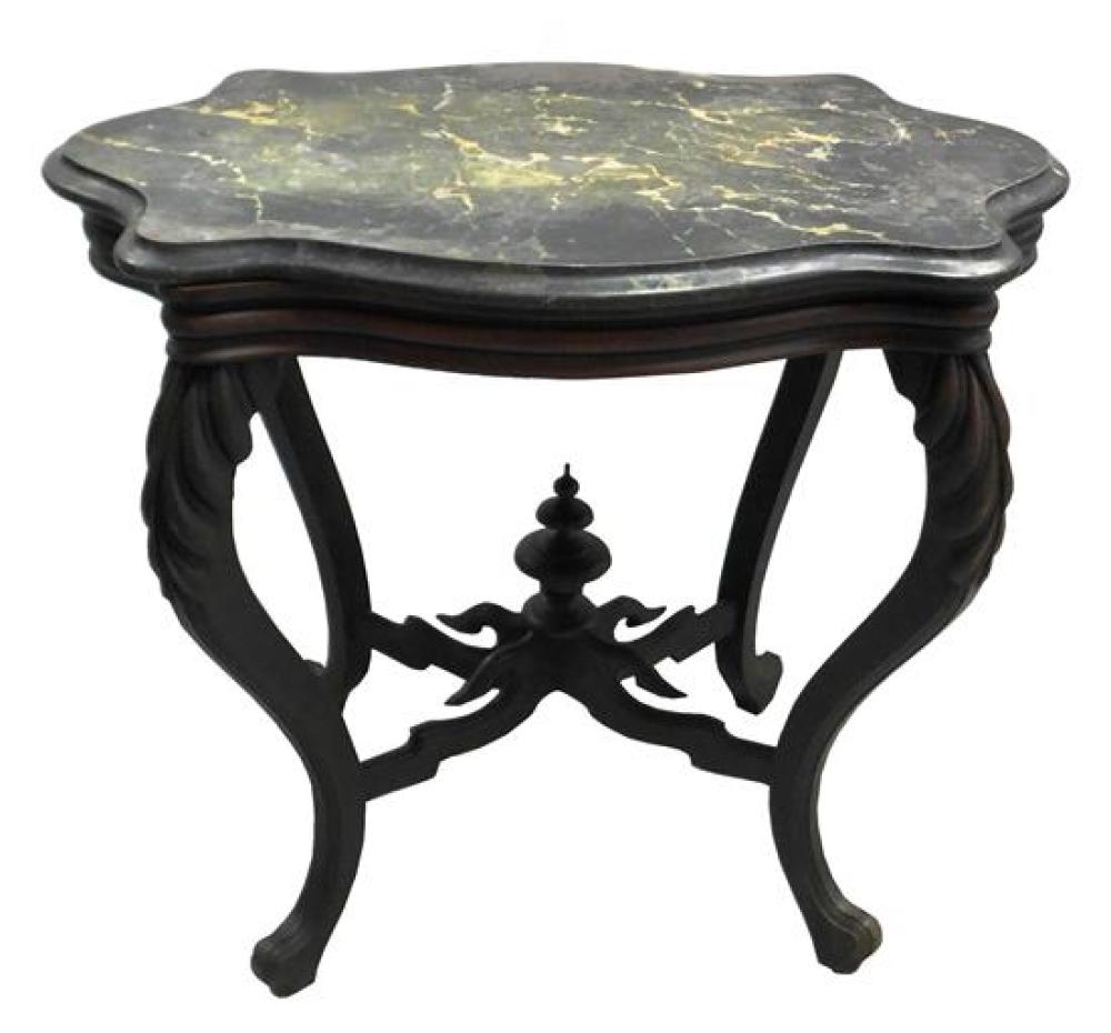 Appraisal: Victorian marble top table shaped black marble ovoid top with