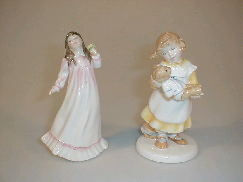 Appraisal: Two Royal Doulton figurines What's the Matter Flowers for Mother