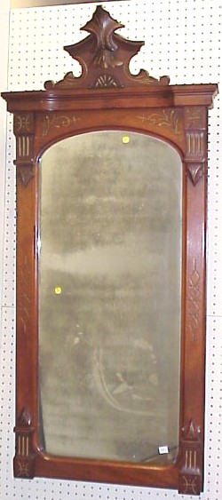 Appraisal: Walnut frame Eastlake wall mirror typical form with scrolled finial