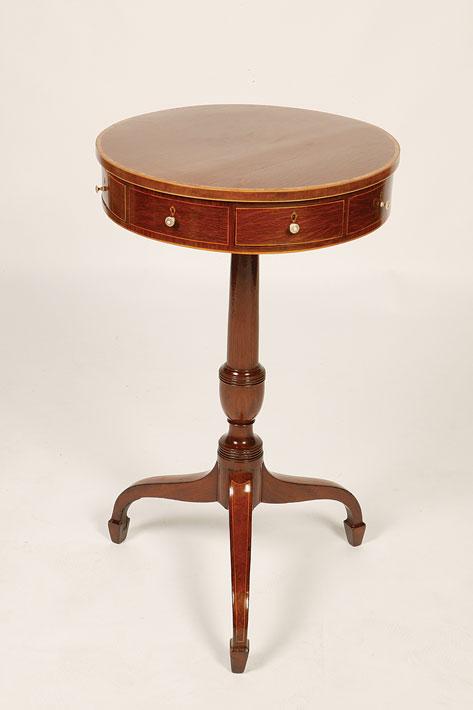 Appraisal: A LATE GEORGE III STYLE PARTRIDGE WOOD DRUM TABLE the