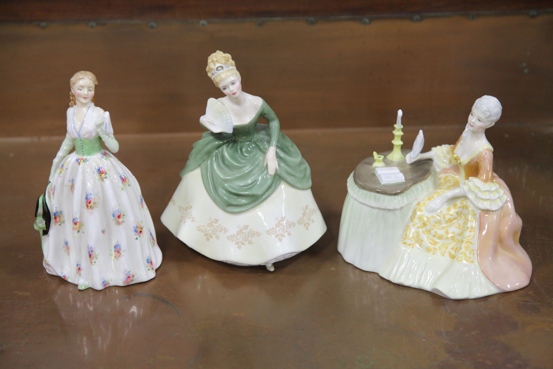 Appraisal: THREE ROYAL DOULTON FIGURES English th century Meditation HN ''h