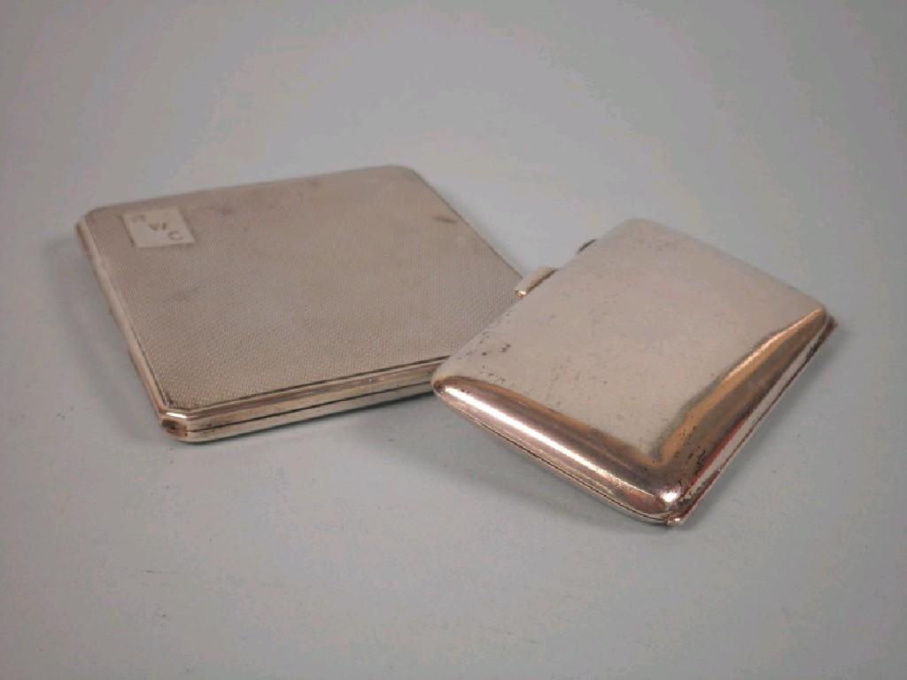 Appraisal: A silver engine turned cigarette case bearing the initials RWC