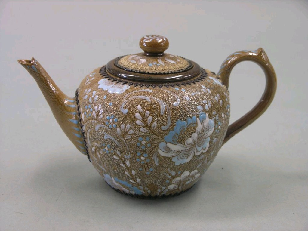 Appraisal: A late Victorian Doulton Slaters Patent teapot near-globular shape with