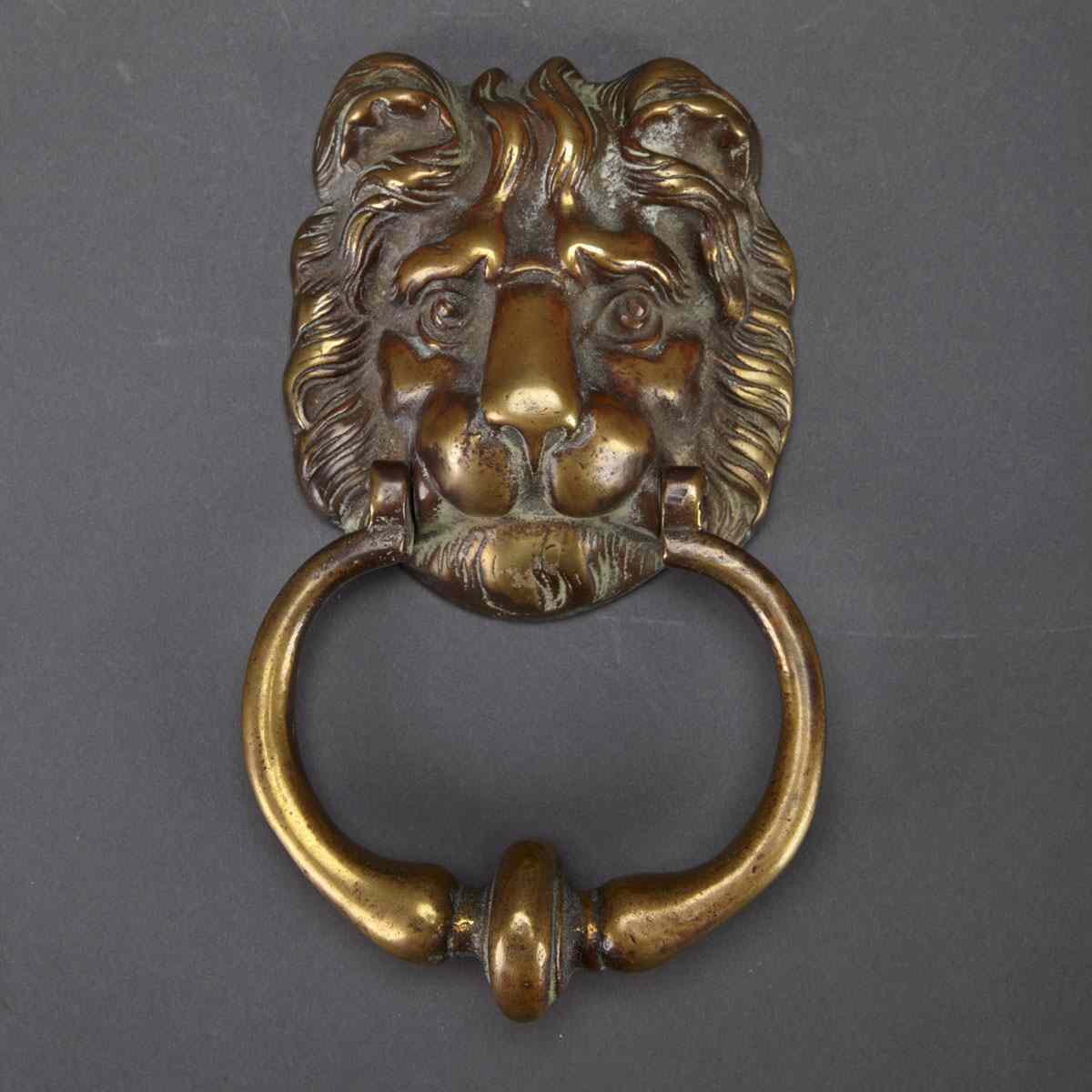 Appraisal: Brass Lion mask Door Knocker early th century height cm