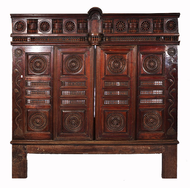 Appraisal: A TH CENTURY FRENCH WALNUT 'NORMANDY LIT' the panel enclosing