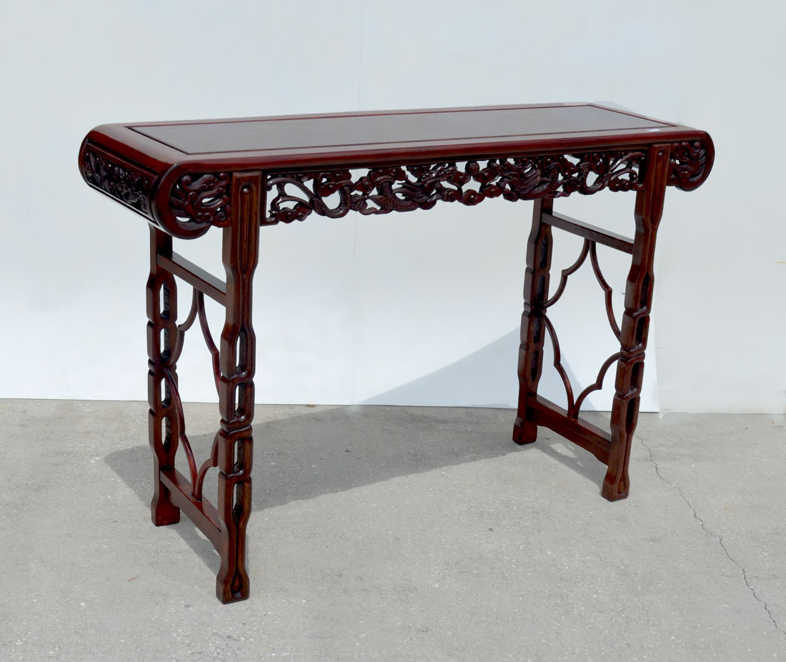 Appraisal: CHINESE CARVED HIGH ALTAR TABLE Pierced carved skirt with dragon