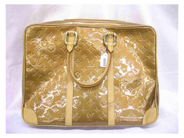 Appraisal: Louis Vuitton handbag monogrammed copper vernis handled briefcase with leather