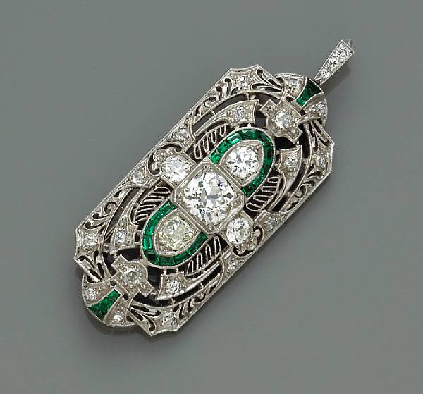 Appraisal: An emerald and diamond openwork brooch - pendant central diamond