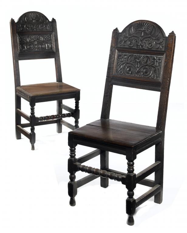 Appraisal: A PAIR OF WILLIAM III JOINED OAK PANEL-BACK CHAIRS LANCASHIRE