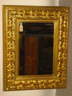 Appraisal: A CARVED GILT WOOD MIRROR th century the later oblong