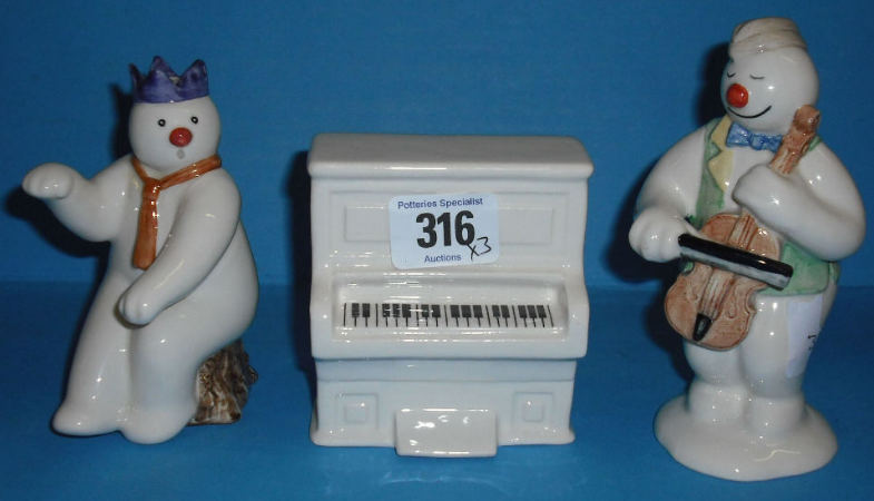 Appraisal: Royal Doulton Snowman Figure Pianist DS Piano DS And Cellist