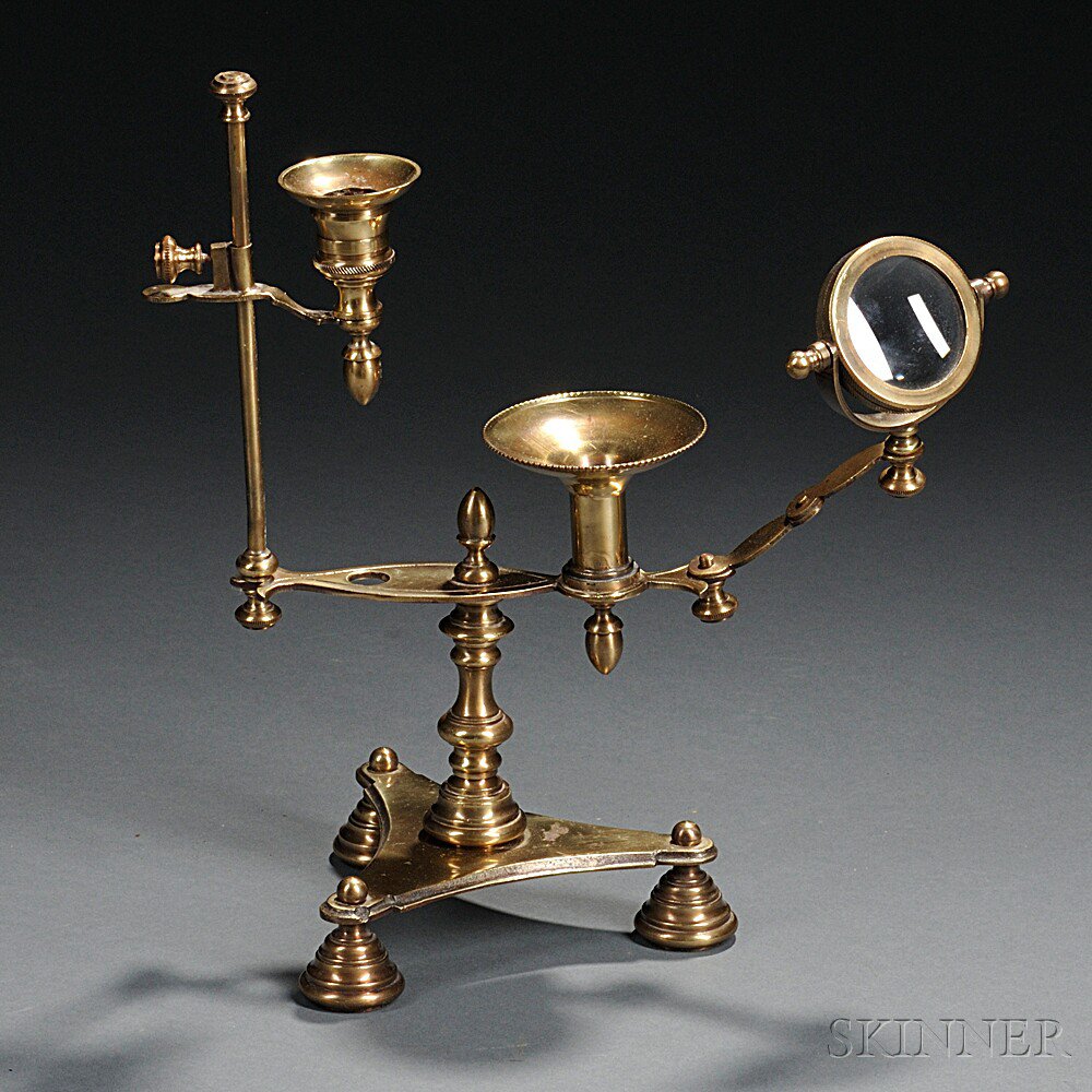 Appraisal: Adjustable Brass Dual Candle Lens Lamp a single adjustable candlestick