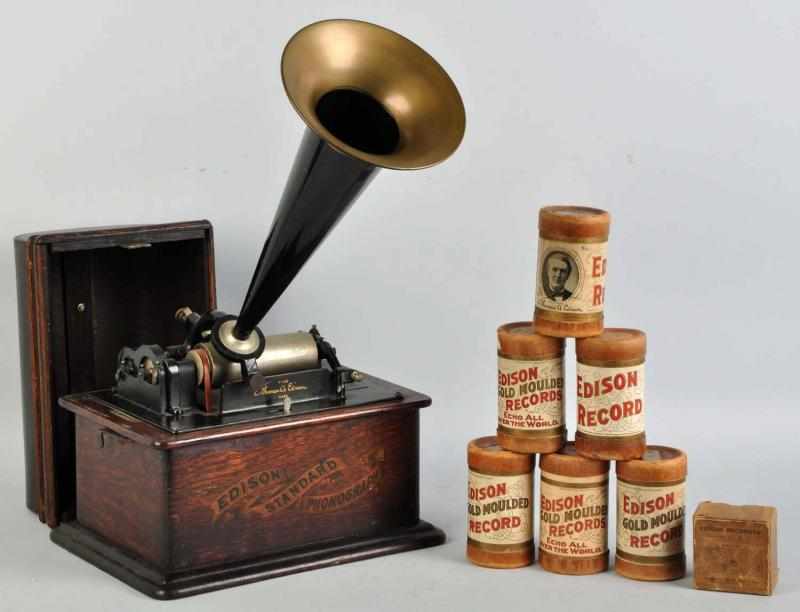 Appraisal: Wooden Edison Gramophone with Cylinders Oak case Working Includes several