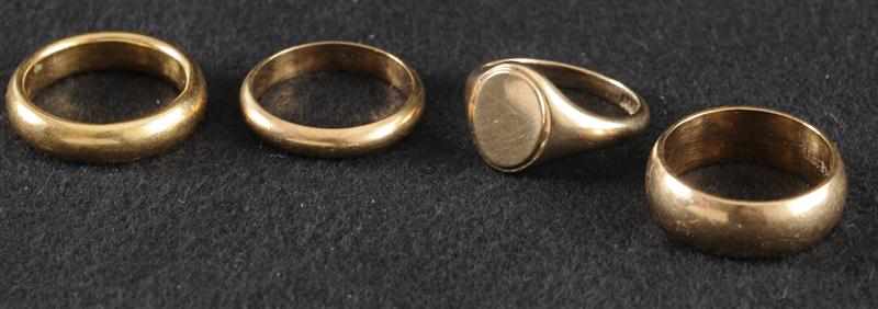 Appraisal: THREE GOLD WEDDING BANDS AND A SIGNET RING Provenance The