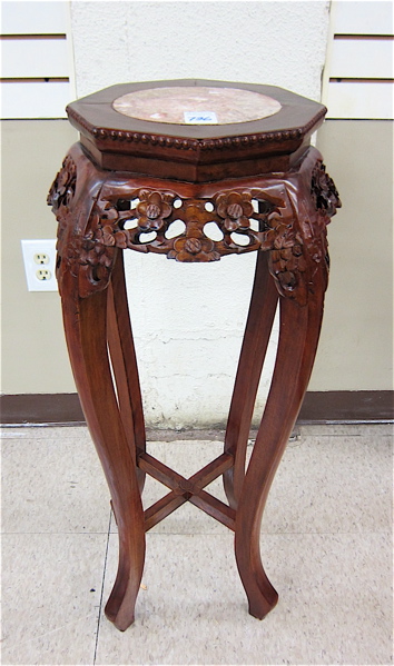 Appraisal: CHINESE CARVED ROSEWOOD PEDESTAL PLANT STAND having an octagonal top