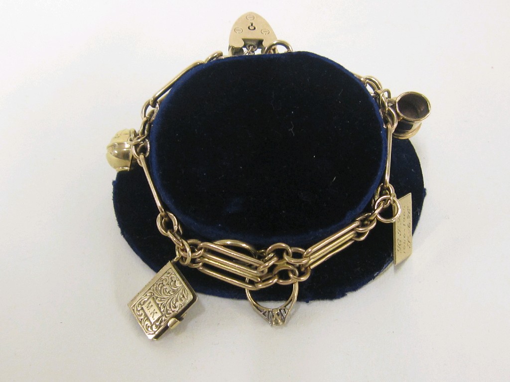 Appraisal: Nine carat gold charm bracelet Approx gms