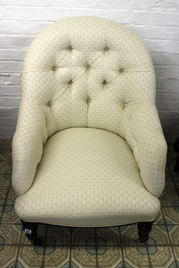 Appraisal: A Victorian mahogany frame button down upholstered nursing chair on