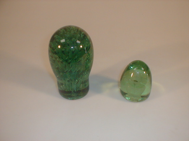 Appraisal: A thC green glass dump internally decorated with plant forms