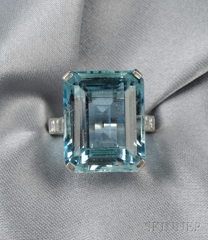 Appraisal: Platinum Aquamarine and Diamond Ring set with an emerald-cut aquamarine