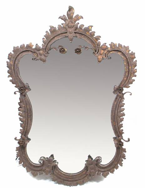 Appraisal: A Spanish Baroque style wrought metal mounted mirror height ft