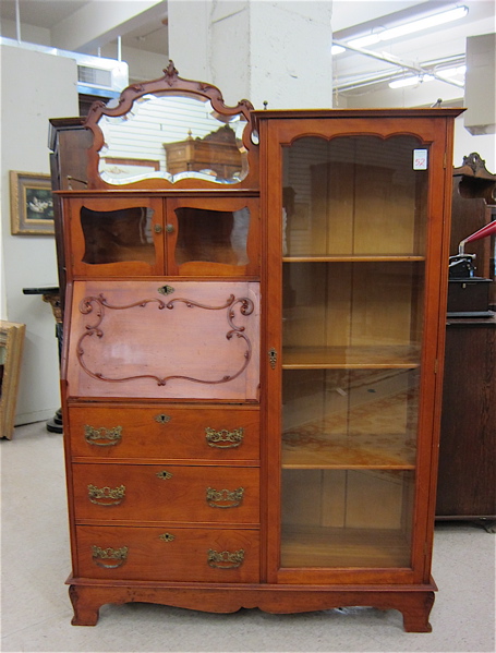 Appraisal: LATE VICTORIAN SECRETARY BOOKCASE American c overall cherry finish the