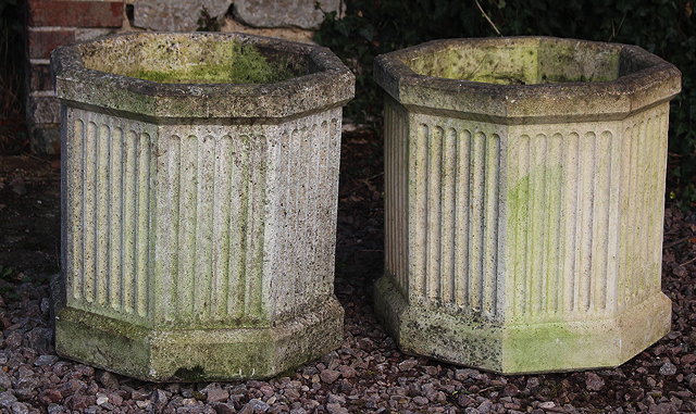 Appraisal: A PAIR OF ART DECO STYLE CAST CONCRETE FLUTED OCTAGONAL