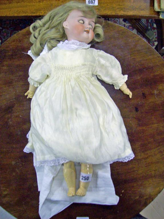 Appraisal: An early th century porcelain headed doll to include some