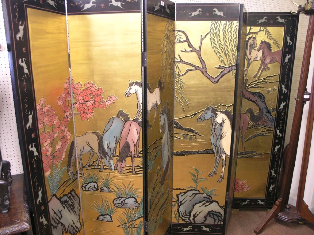 Appraisal: A Chinese black lacquered folding screen with painted decoration ft