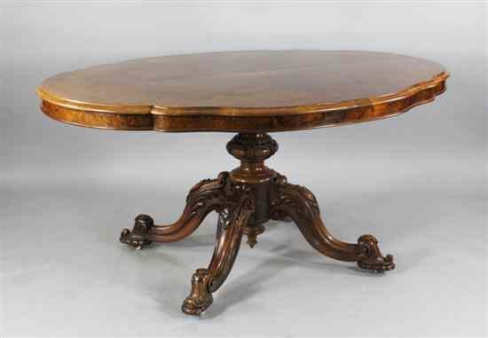 Appraisal: A Victorian burr walnut serpentine loo table on carved legs