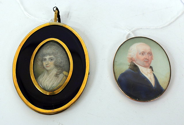 Appraisal: A GEORGIAN OVAL PORTRAIT MINIATURE of a lady with a