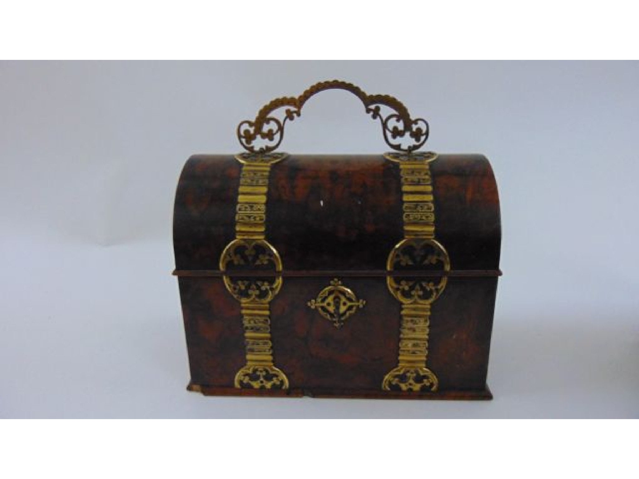 Appraisal: A Victorian burr walnut casket with domed lid overlaid with