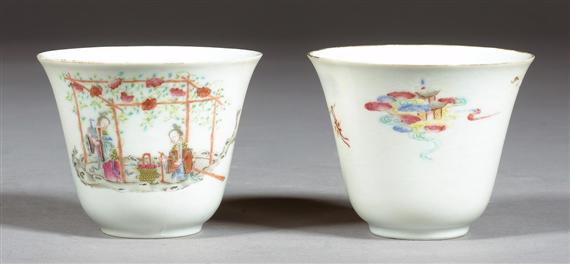 Appraisal: A PAIR OF ENGRAVED CUPS WITH TWO FAMILLE ROSE IMMORTAL