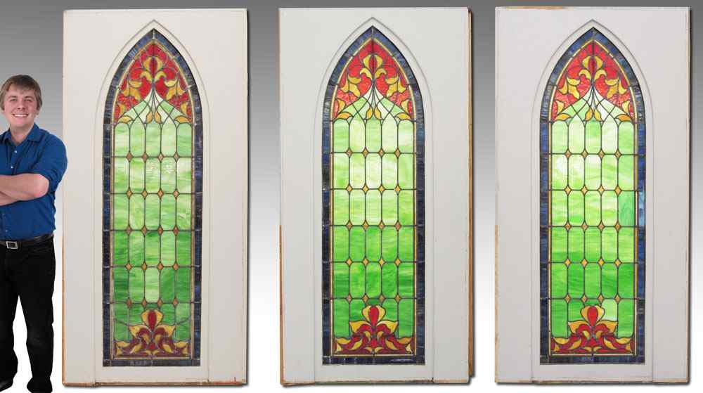 Appraisal: FRAMED ARCHITECTURAL STAINED GLASS WINDOWS matching windows with blue and