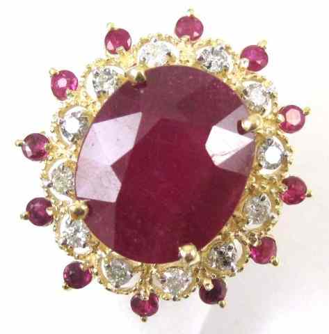 Appraisal: RUBY DIAMOND AND FOURTEEN KARAT GOLD RING twelve round-cut rubies