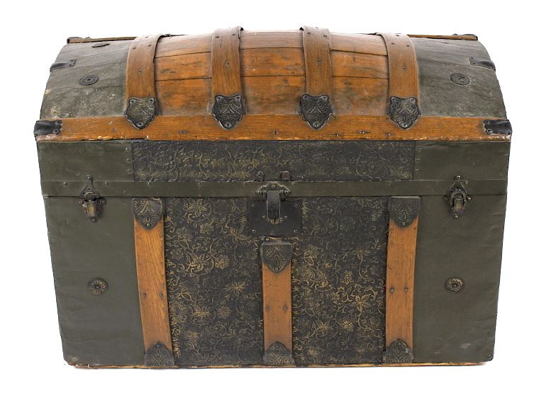 Appraisal: Ornate Early th Century Humpback Wooden Trunk Offered in this