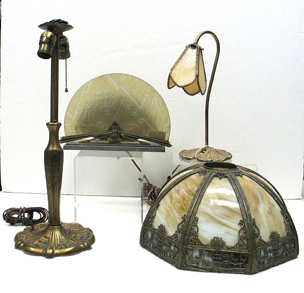 Appraisal: Three glass and metal table lamps th century Comprising butterscotch