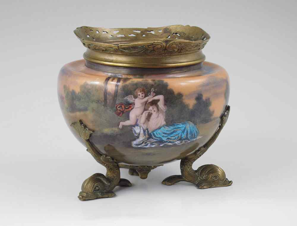 Appraisal: FRENCH ENAMEL JARDINIERE Scenic landscape with cupid and Venus Mounted