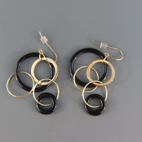 Appraisal: k Gold Black Onyx Earrings intertwinging circles long