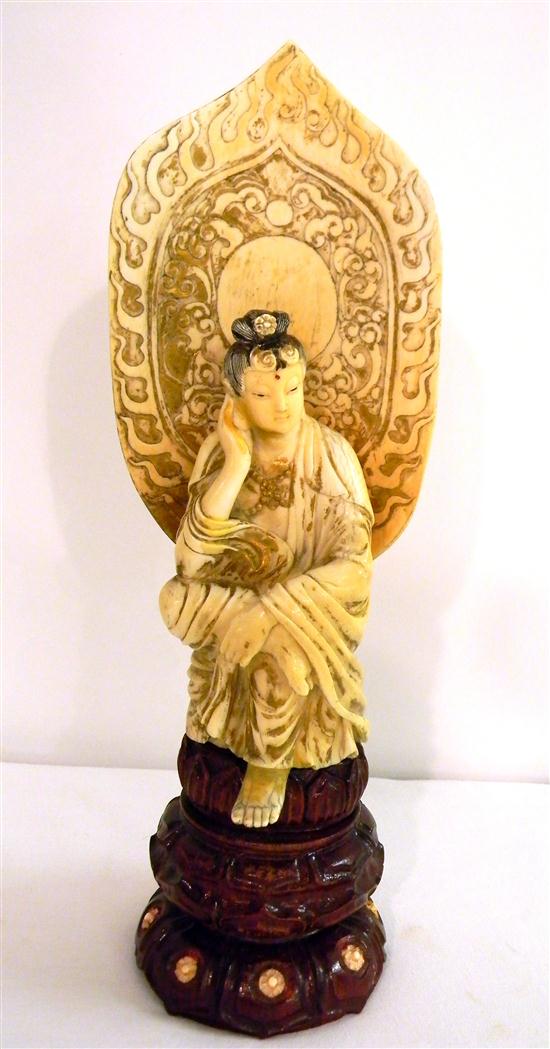 Appraisal: Chinese th century an ivory figure of the watermoon Guanyin