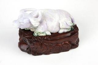 Appraisal: A carved lavender jadeite water buffalo Chinese depicting a water