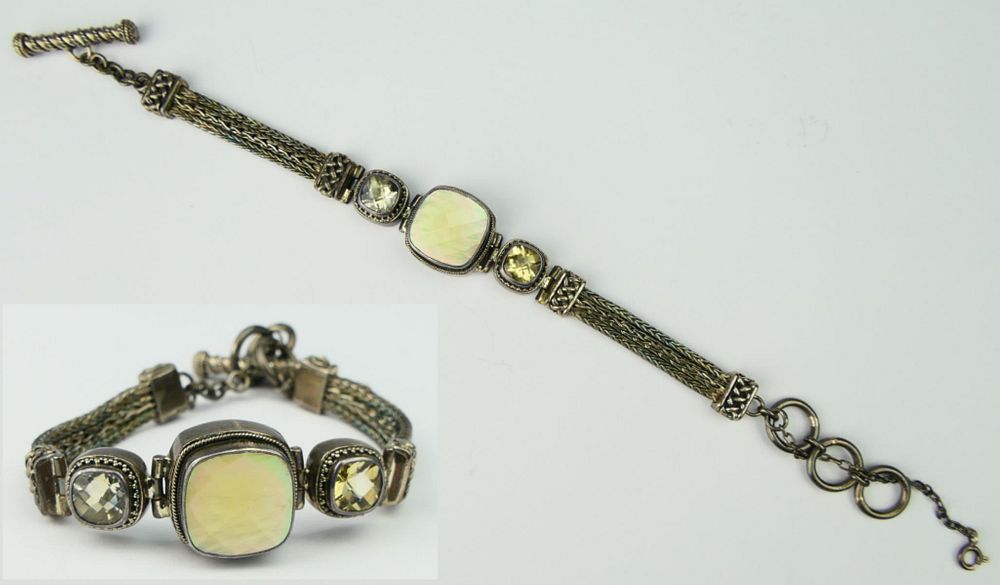 Appraisal: SIGNED LORI BONN STERLING SILVER BRACELET About long with lovely