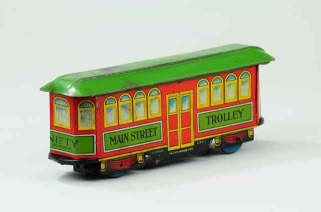 Appraisal: MAIN STREET TROLLEY Nifty lithographed tin colorful red green and