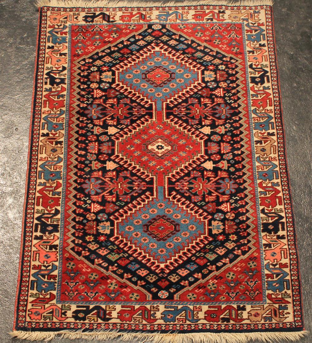 Appraisal: THREE SMALL PERSIAN RUGS INCLUDING A SHIRAZ AND A SAROUK