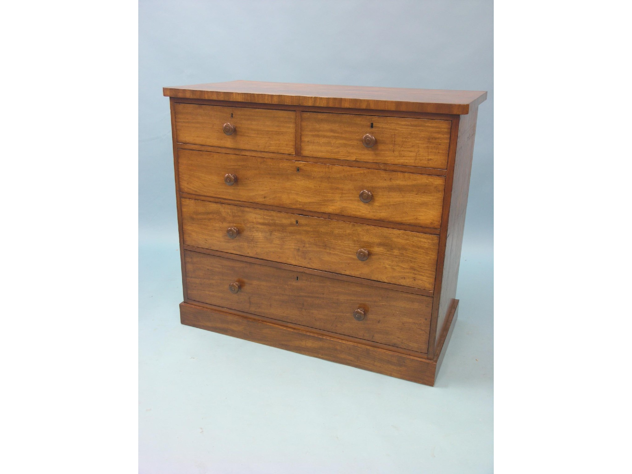 Appraisal: A Victorian mahogany chest two short and three long mahogany-lined