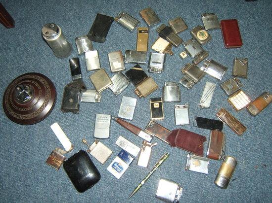 Appraisal: A collection of around thirty different lighters to include Zippo