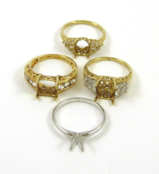 Appraisal: COLLECTION OF FOUR GOLD RING SETTINGS including three k yellow