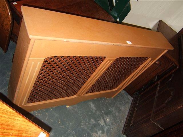 Appraisal: A set of three MDF radiator covers each with pierced