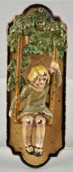 Appraisal: Cast Iron Hubley Girl in Swing Doorknocker Description Difficult to