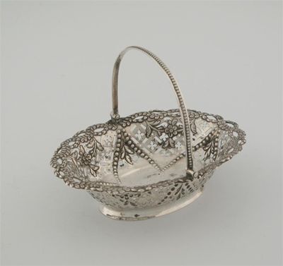 Appraisal: A George III pierced oval bon bon dish with a